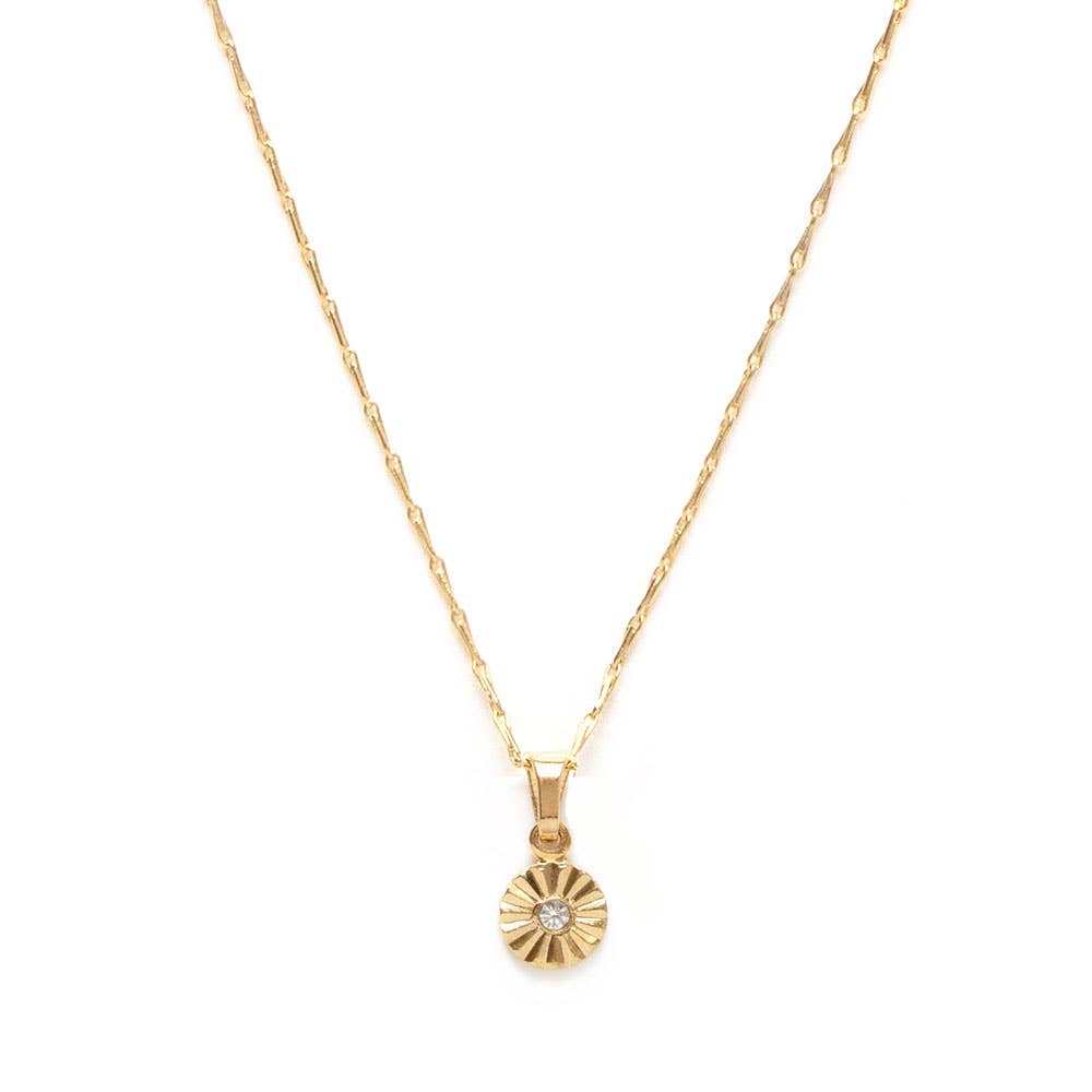 Gold necklace with a sunflower-shaped pendant on a white background
